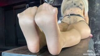 I am sitting on the table and rubbing my nylon feet against each other right above your face - porn video